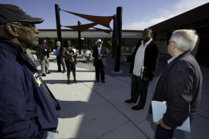 Construction Manager Herman Blackmon, Jr., second from right, leads members of the Citizens Bond Oversight Committee on a tour of a newly renovated science